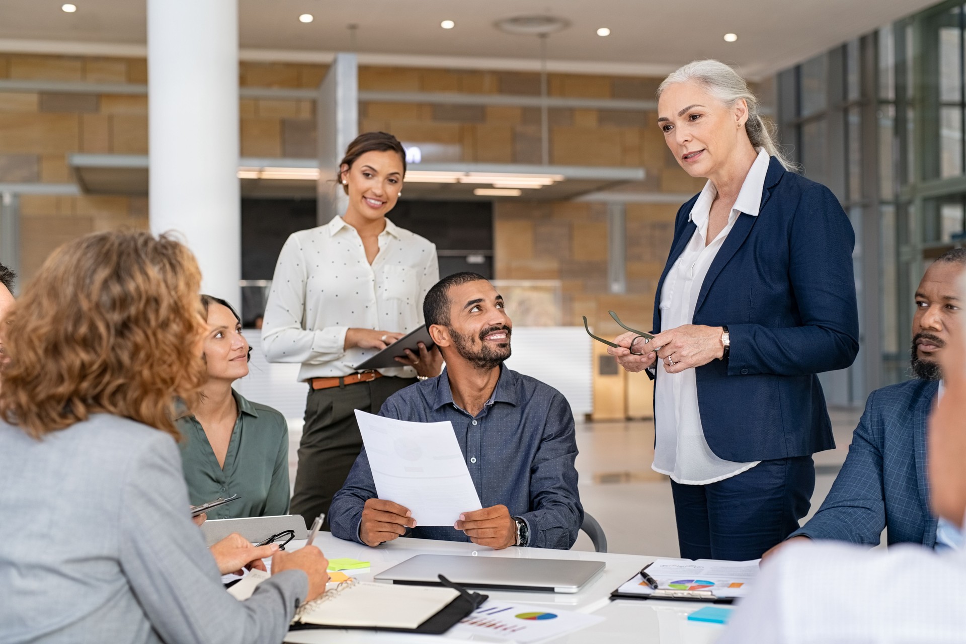 Multiethnic business team in meeting at modern board room